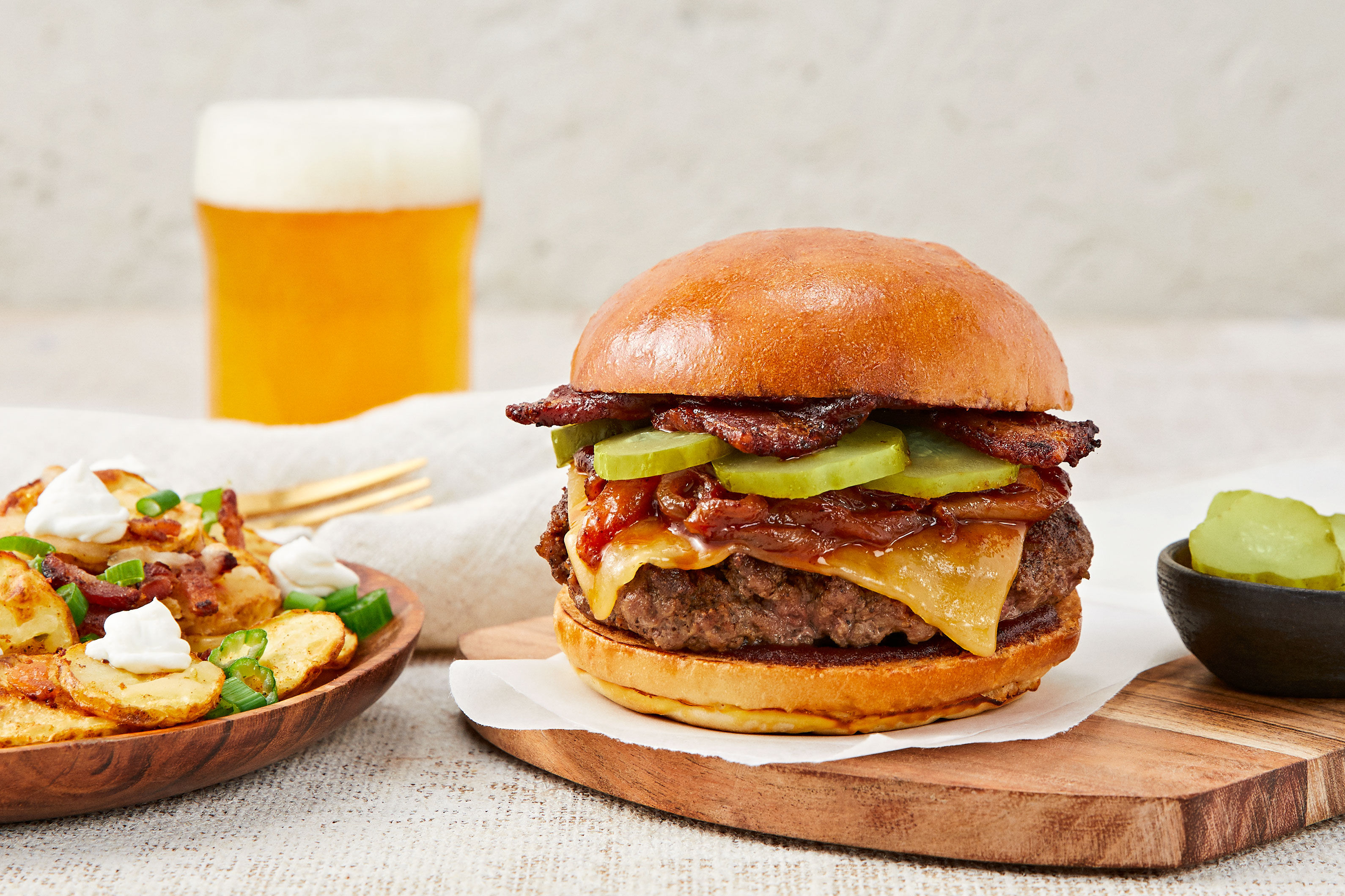 Bacon Buckaroo Burgers: BBQ Caramelized Onion & Cheesy Loaded Potato Rounds