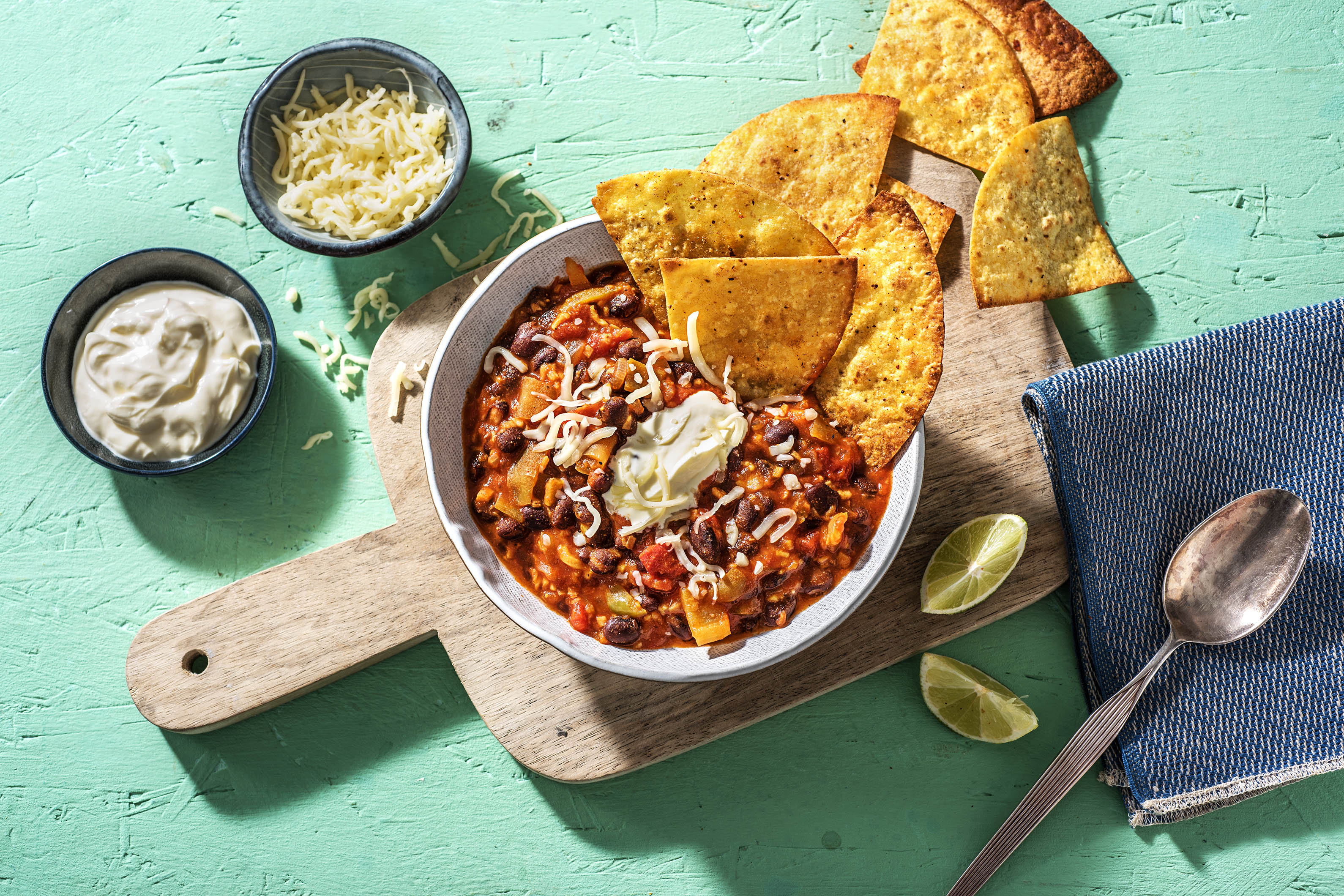 Black Bean Chili: Zesty Tortilla Chips and Spicy Crema