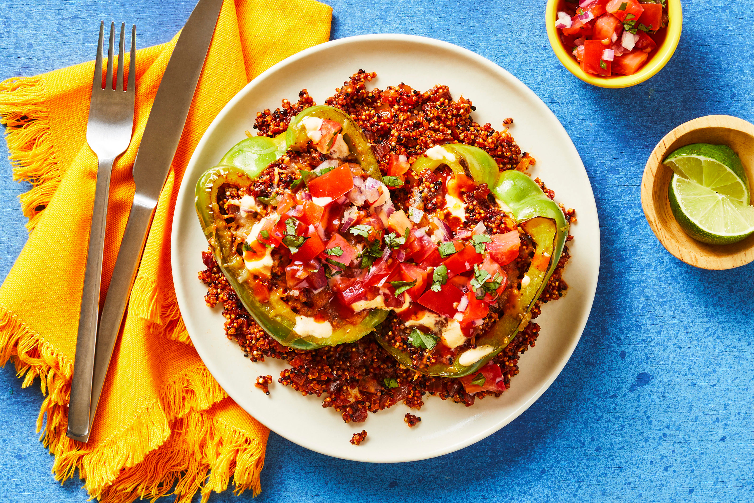 Cheesy Quinoa-Stuffed Peppers: Pico de Gallo & Smoky Red Pepper Crema