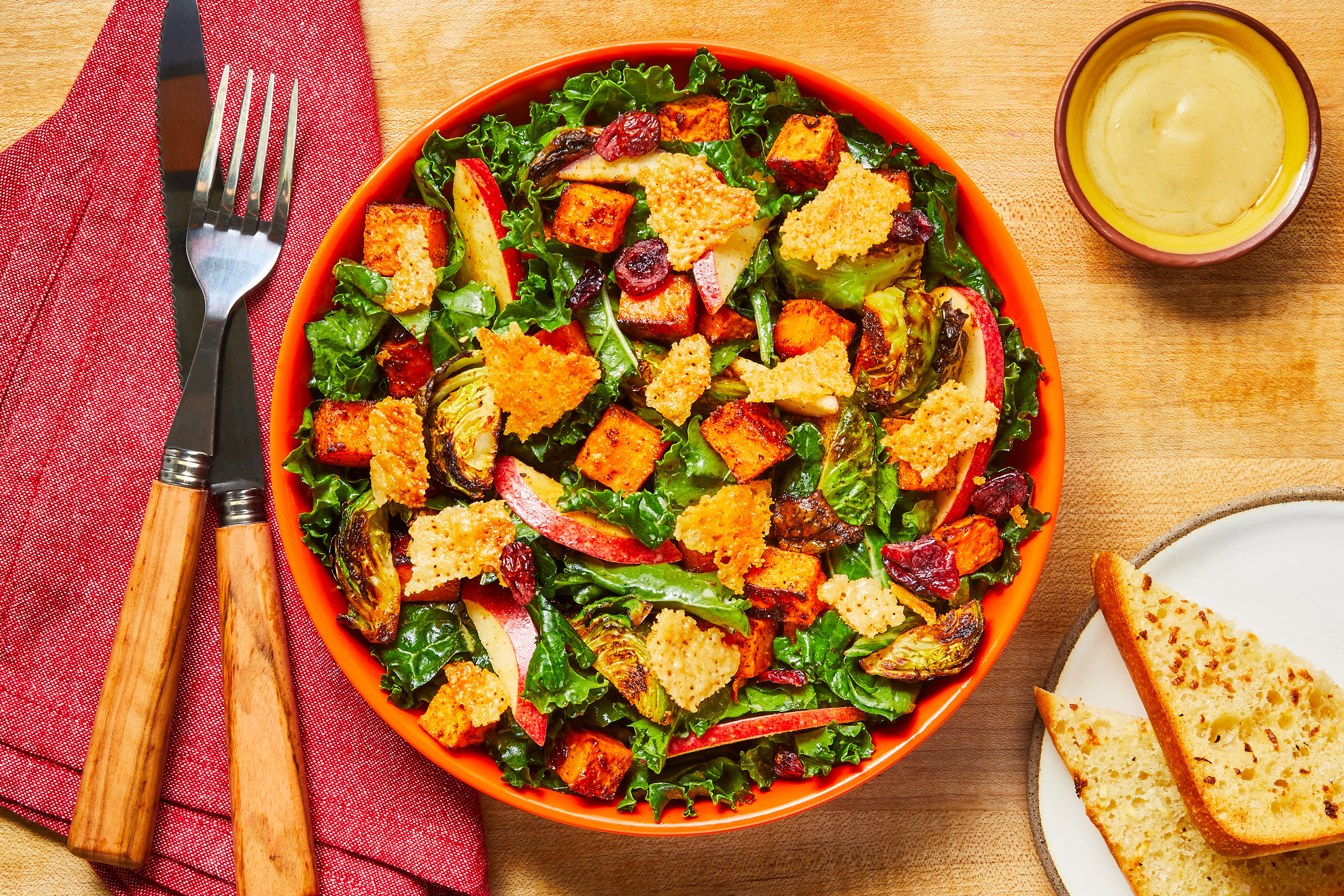 Cranberry-Apple Kale Salad: Parm Frico & Garlic Ciabatta